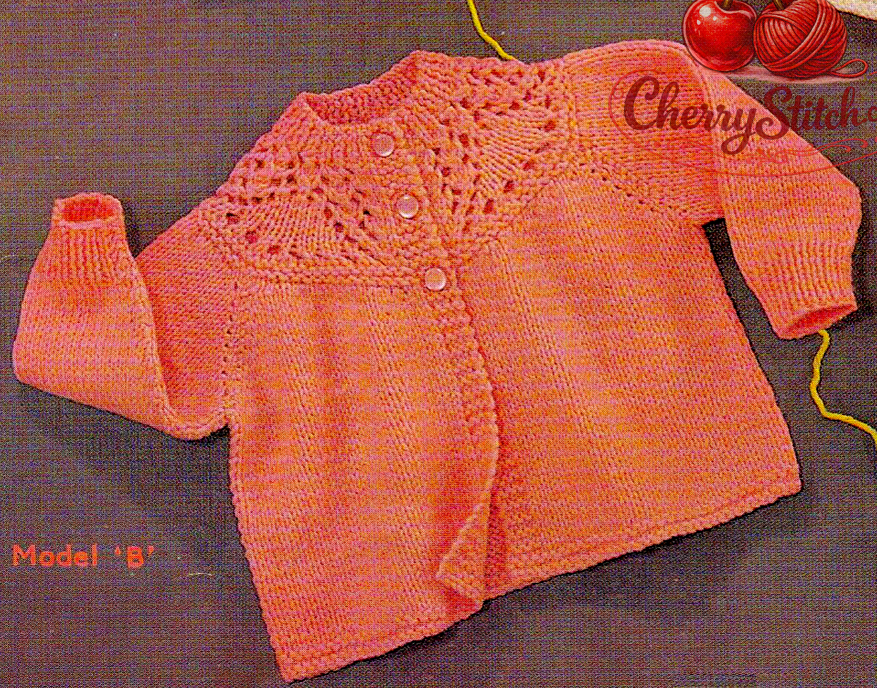 Close-up of orange baby cardigan with pretty lacy yoke and raglan sleeves – restored vintage 1960s matinee coat knitting pattern in DK