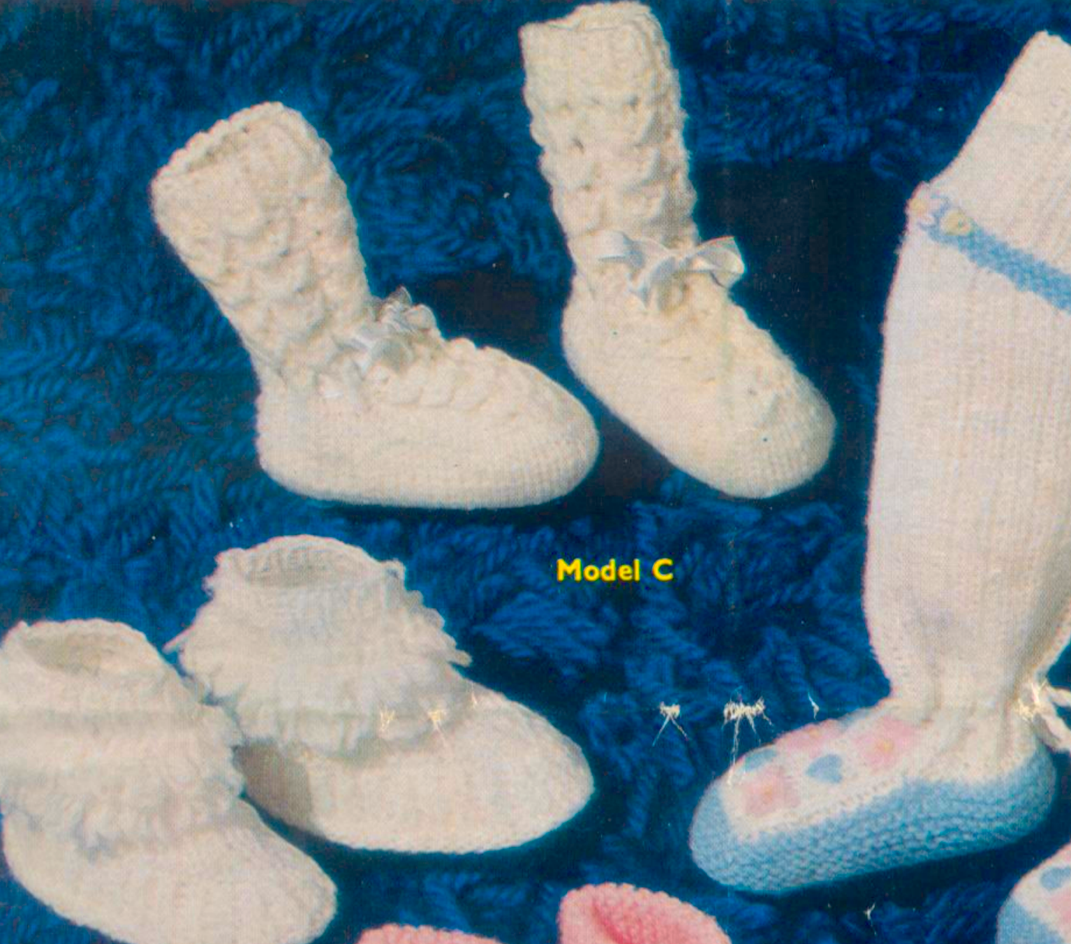 Close-up of 6 baby bootee and knee-high sock designs – restored vintage 1960s knitting pattern in DK and 3-ply, worked on two needles-more-designs