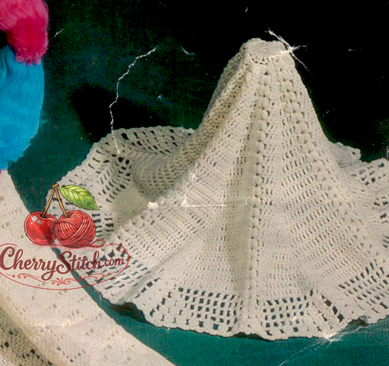 Close-up of crocheted baby circular shawl with lacy border, worked in the round. Restored vintage 1960s crochet pattern in DK, 44'' diameter.