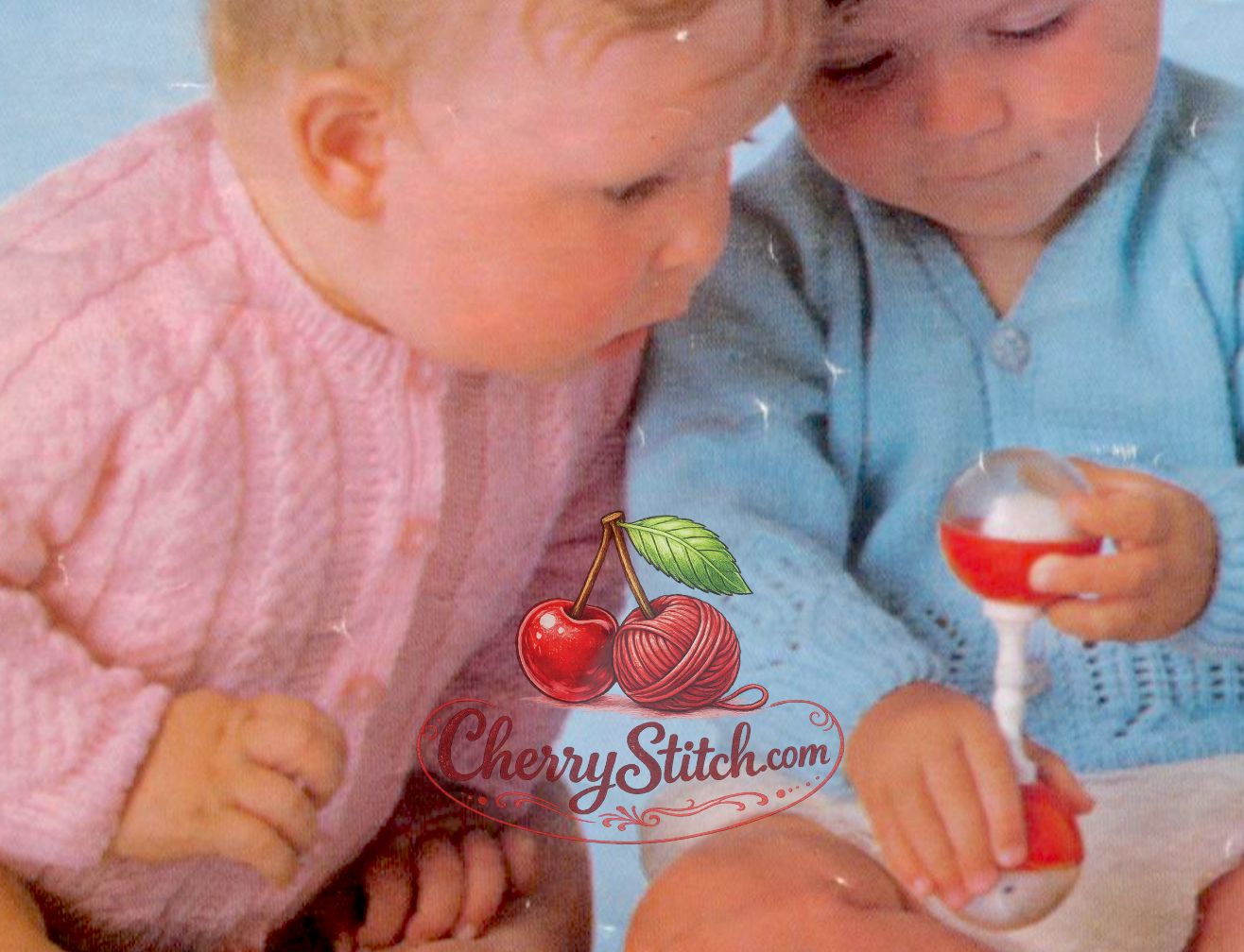 Close-up of two baby cardigans. Restored vintage 1970s knitting pattern in 4-ply.