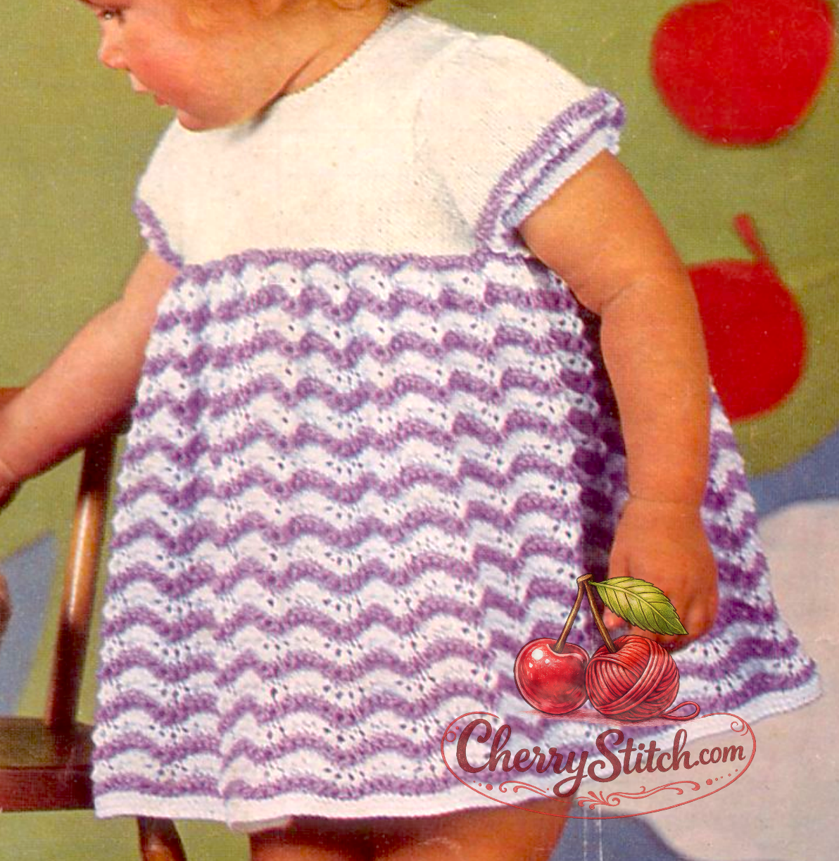 Close-up of flowing Old Shale zig-zag lace stitch on skirt of vintage 1960s baby toddler dress. Restored knitting pattern in 4-ply — delicate rippled texture with heirloom quality.