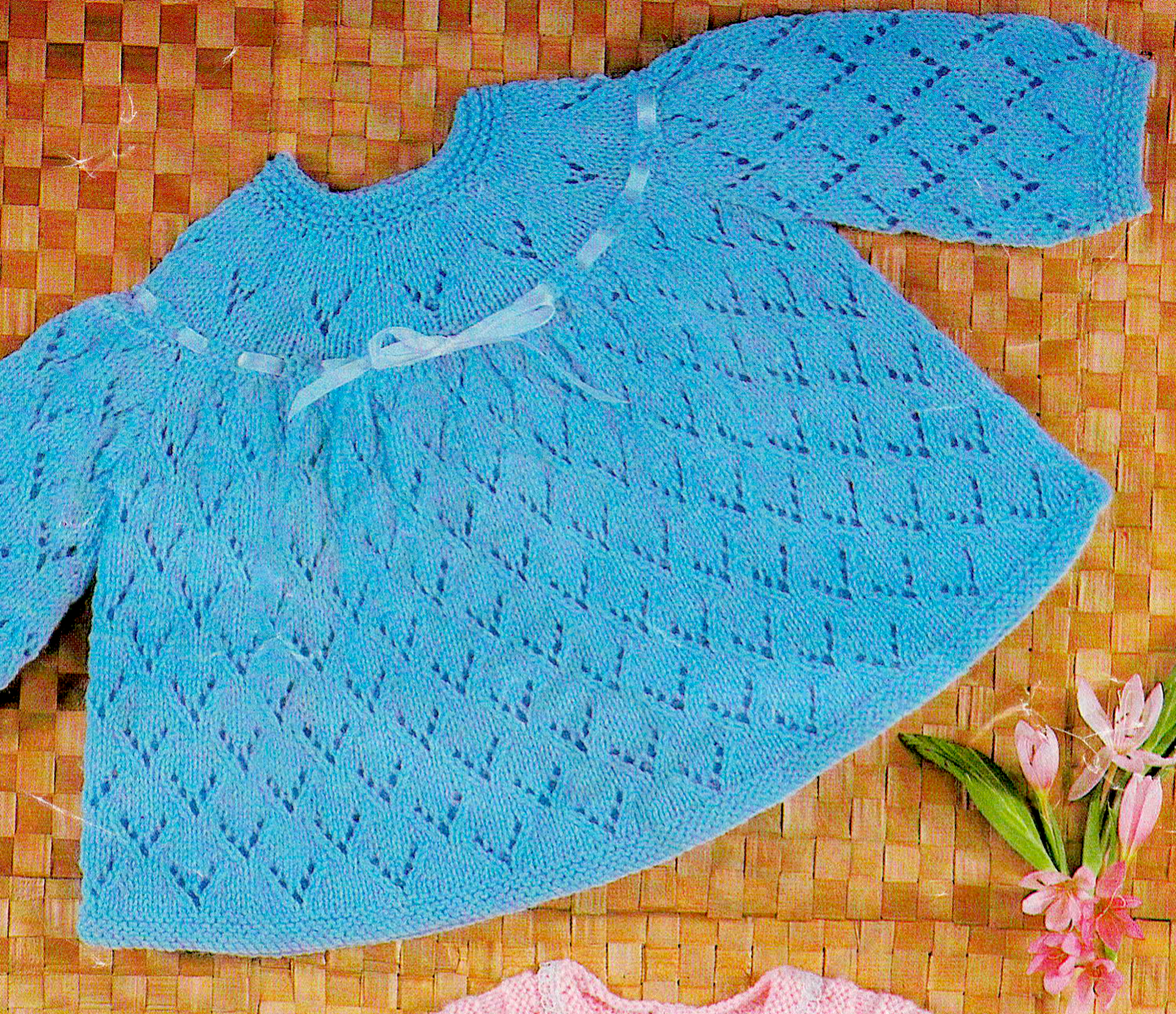 Vintage 1970s baby angel top knitting pattern, design 1. Yoke with delicate lace skirt and sleeves in a unique lace stitch. Restored 4-ply pattern.
