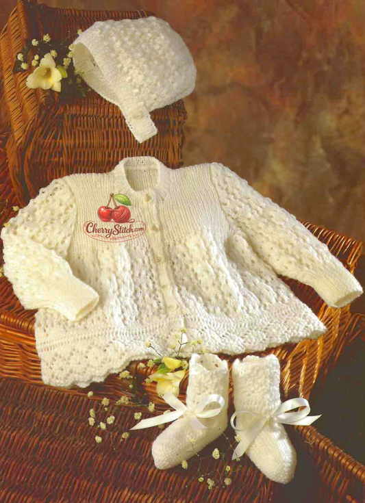 Vintage 1980s baby lace matinee coat cardigan, bonnet and bootees set knitting pattern. Wide A-line skirt in airy lace stitch with scalloped diamond lace edging. 4-ply, 14''–20'', Birth to 6/9 months.