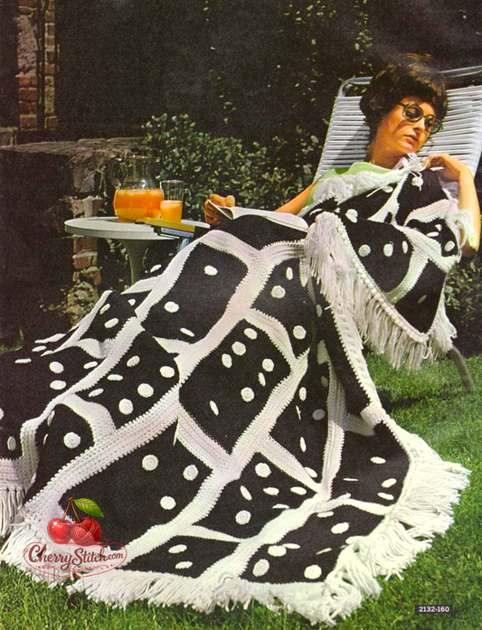 Vintage 1968 domino afghan blanket crochet pattern. 7 strips of domino tile designs in two colours, full fringe around entire edge. Worsted Aran weight, 55'' x 68''. US crochet terms.