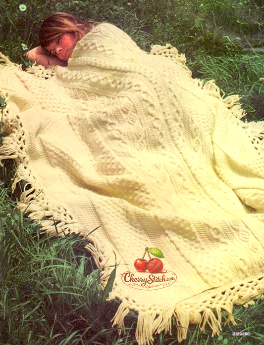 Vintage 1968 Aran afghan blanket knitting pattern. 4 different Aran stitch strips — Mock Honeycomb, Aran Cables, Chain Cables and Bobbles. Fringed edge, Worsted Aran weight, 50'' x 64''.