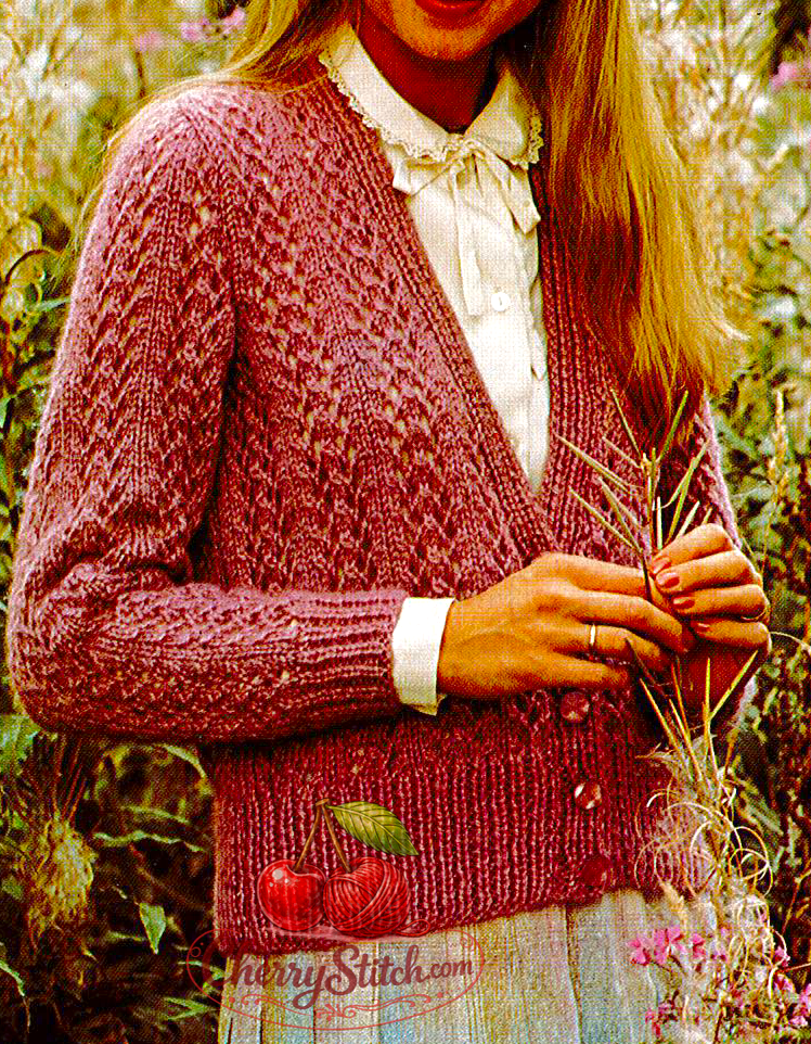 Close-up of all-over lace stitch on vintage 1980s women's cardigan knitting pattern. Restored elegant design — delicate lace texture, deep V-neck, Aran yarn.