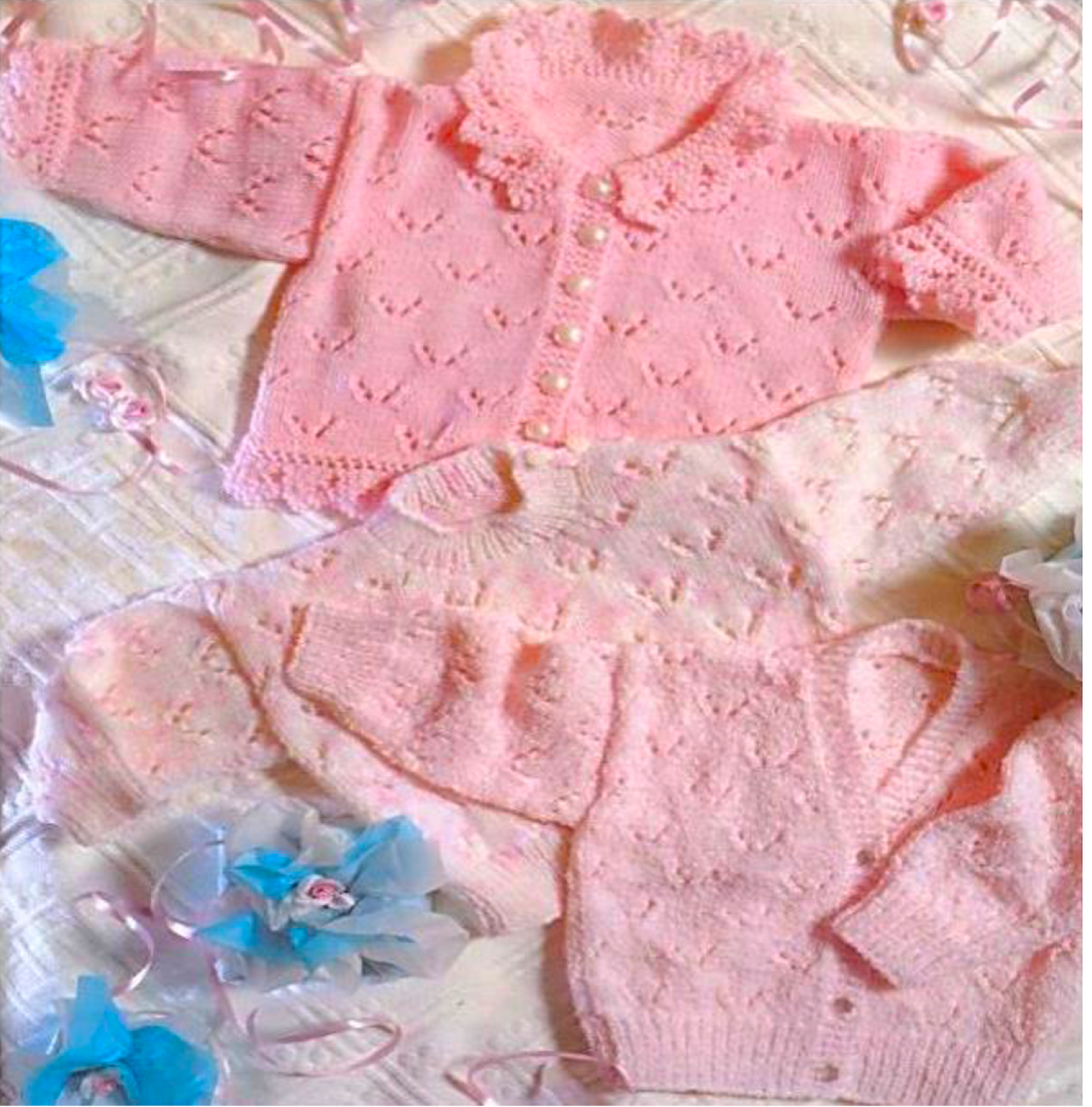 Second view of vintage baby girl lacy cardigan and sweater knitting pattern. Restored all-over lace designs — round and V-neck cardigans, sweater, DK yarn, 14''–20'', premature to 12 months.