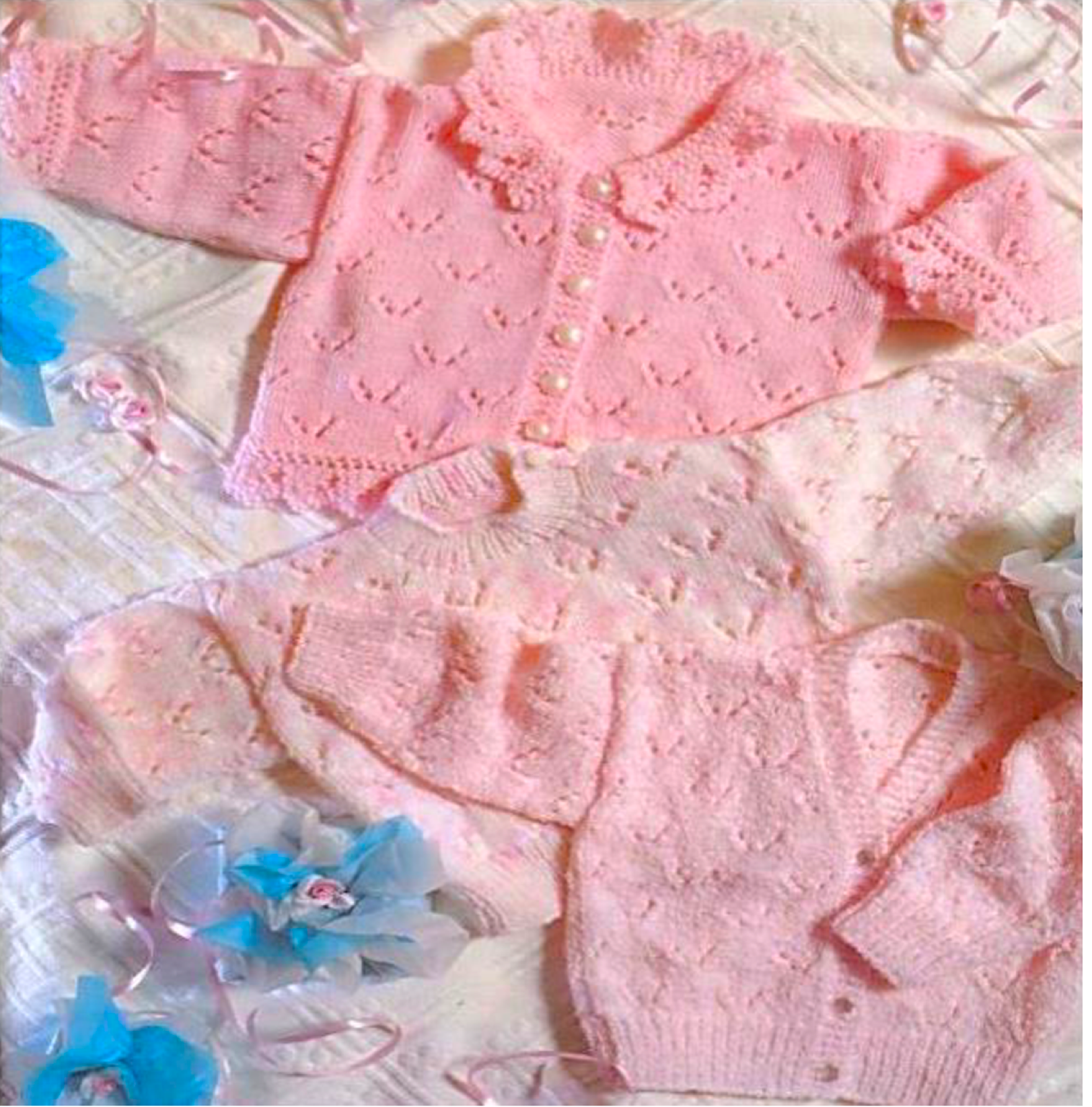 Second view of vintage baby girl lacy cardigan and sweater knitting pattern. Restored all-over lace designs — round and V-neck cardigans, sweater, DK yarn, 14''–20'', premature to 12 months.
