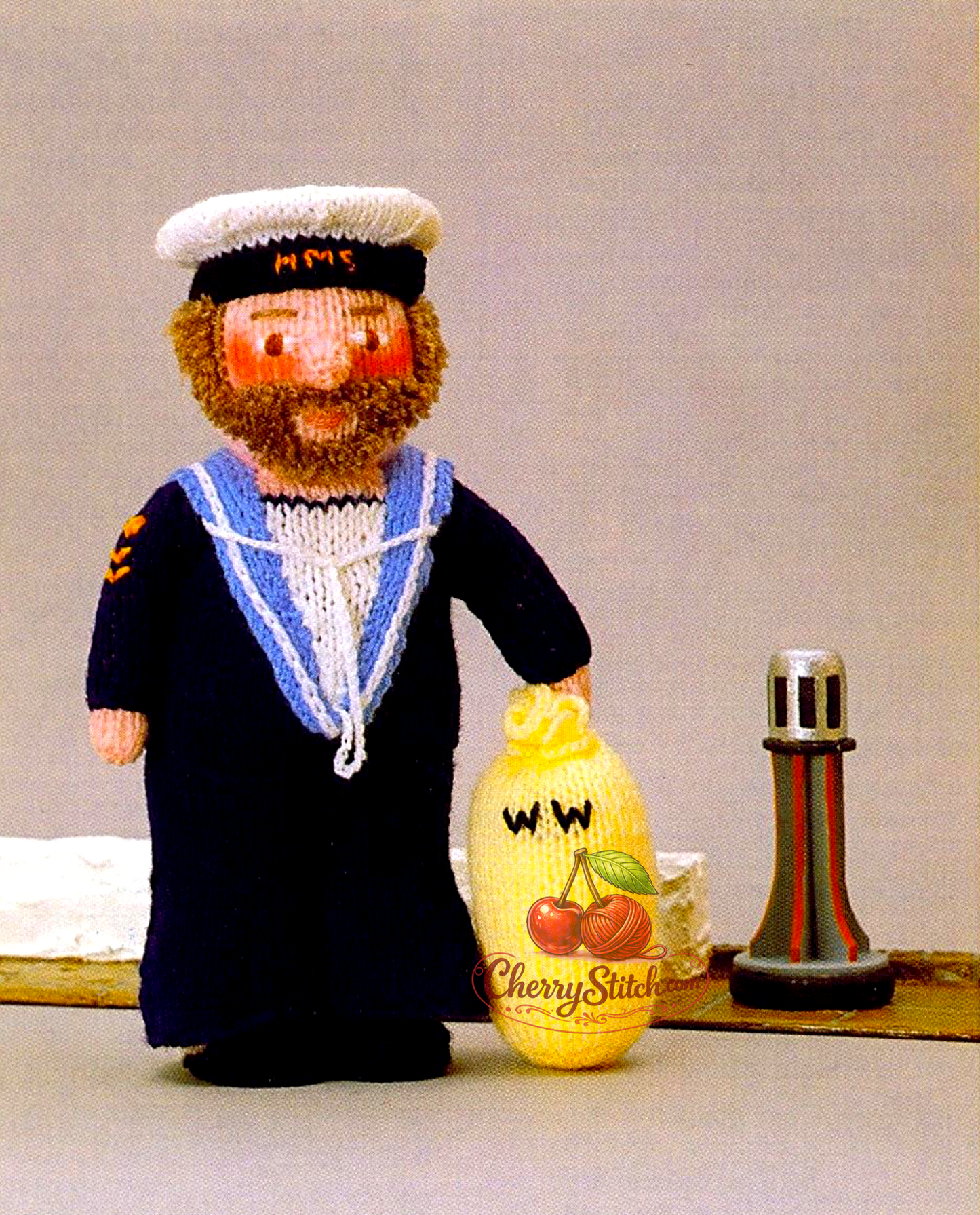 Vintage Woolly Wotnots Sailor doll and Kit Bag knitting pattern — soft stuffed toy, 12'' (30 cm) tall. Adorable retro nautical character doll, DK and 4ply yarn. Great gift idea for baby and child. Intermediate knitting.
