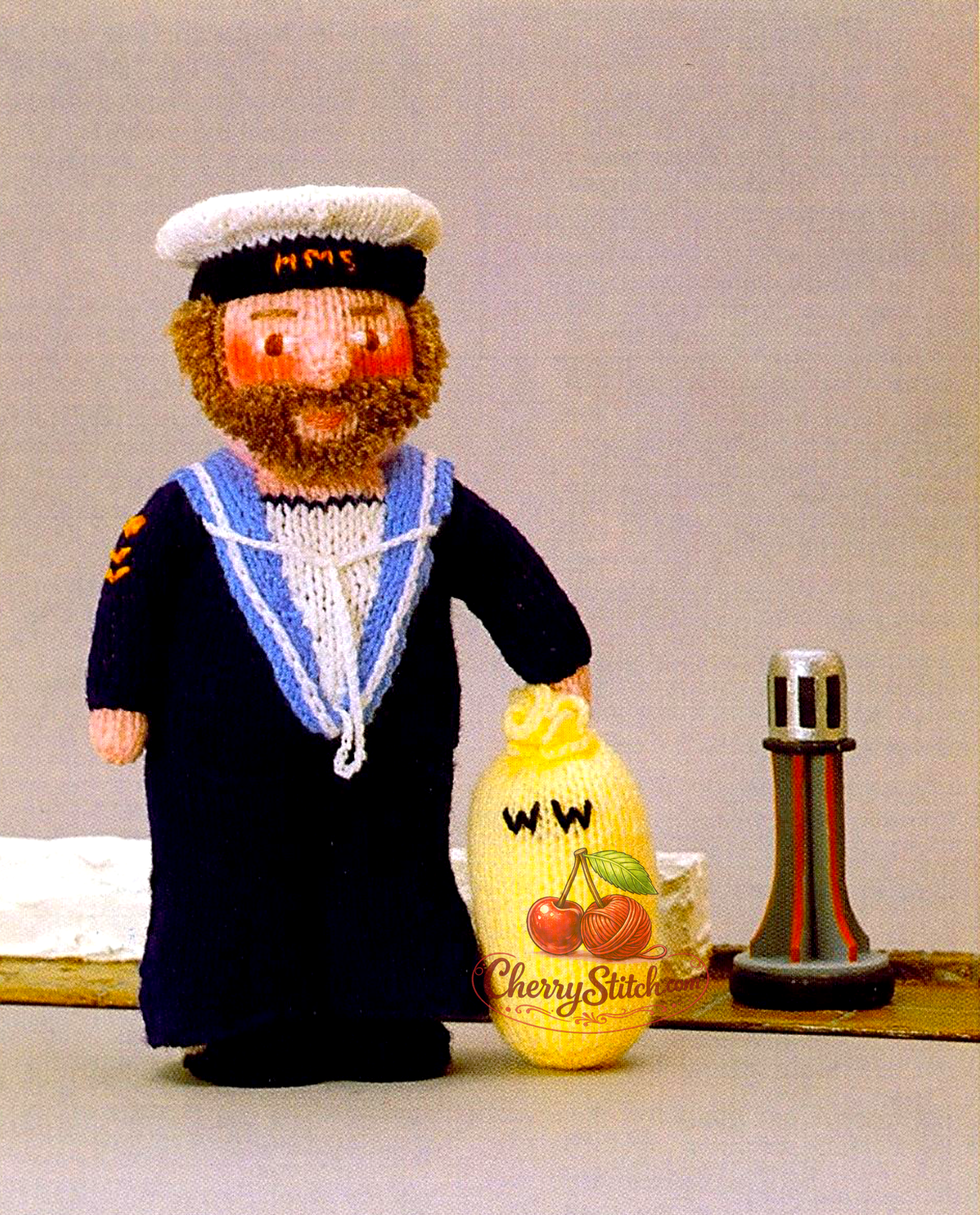 Vintage Woolly Wotnots Sailor doll and Kit Bag knitting pattern — soft stuffed toy, 12'' (30 cm) tall. Adorable retro nautical character doll, DK and 4ply yarn. Great gift idea for baby and child. Intermediate knitting.