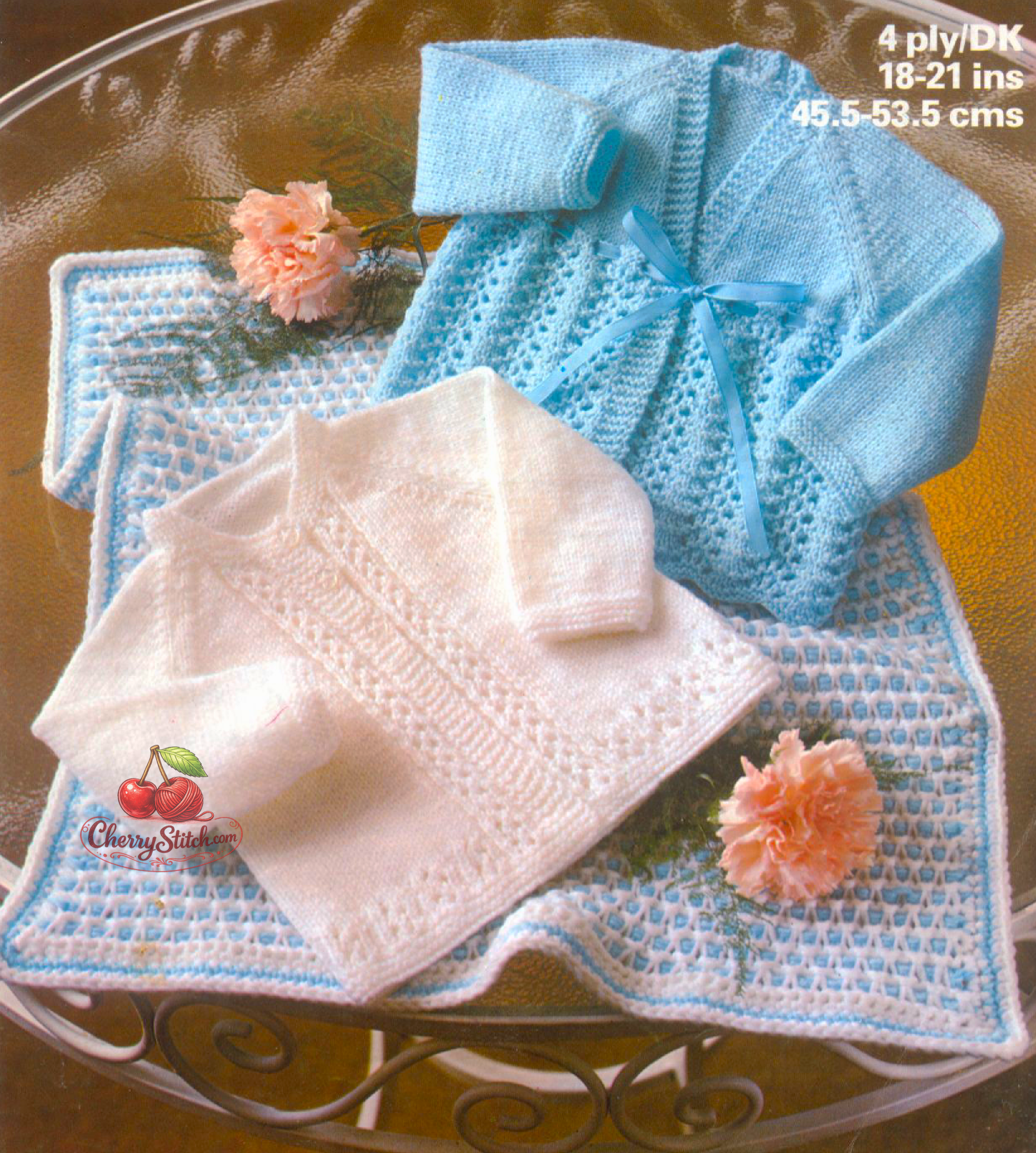 Vintage baby matinee jacket and pram cover knitting pattern — 2 lace designs, raglan sleeves, V-neck and round neck versions. Jackets worked in one piece to armholes. 4ply yarn for jackets, DK for pram cover. 18''–21'' (45.5–53.5 cm) chest, approx. 6–18 months. Intermediate knitting.