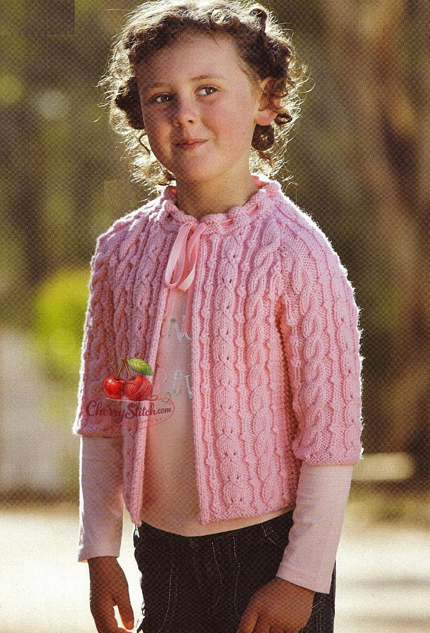 Vintage girl's Aran cable open front jacket knitting pattern — raglan sleeves, elbow length, variety of cable stitch work throughout, worked bottom up. DK 8ply yarn, 52–75 cm chest, approx. 1–10 years. Intermediate knitting.