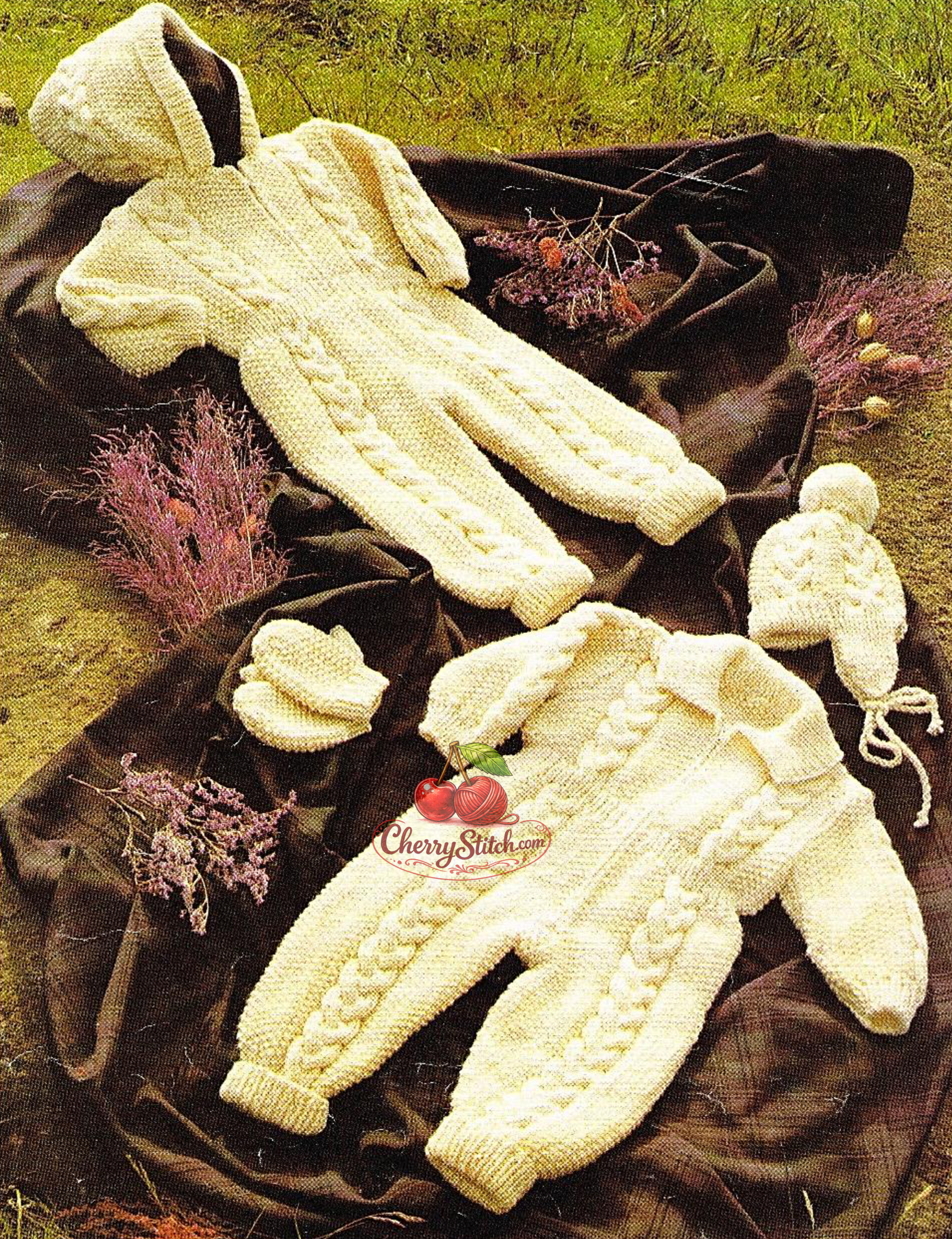 Vintage baby Aran all-in-one suit, hat and mittens knitting pattern — cable panels throughout, collar or hooded version. Aran 10ply yarn, 16''–22'' (41–56 cm) chest, approx. birth to 2 years. Intermediate knitting.