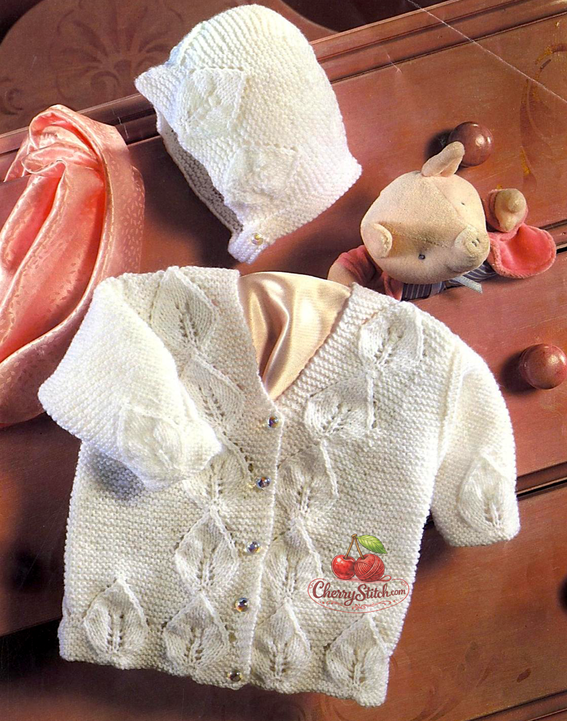 Vintage baby jacket and bonnet knitting pattern — leaf panels throughout, V-neck, worked in one piece to armholes, bottom up. Large print. 4ply yarn, 16''–20'' (41–51 cm) chest, approx. birth to 12 months. Intermediate knitting.