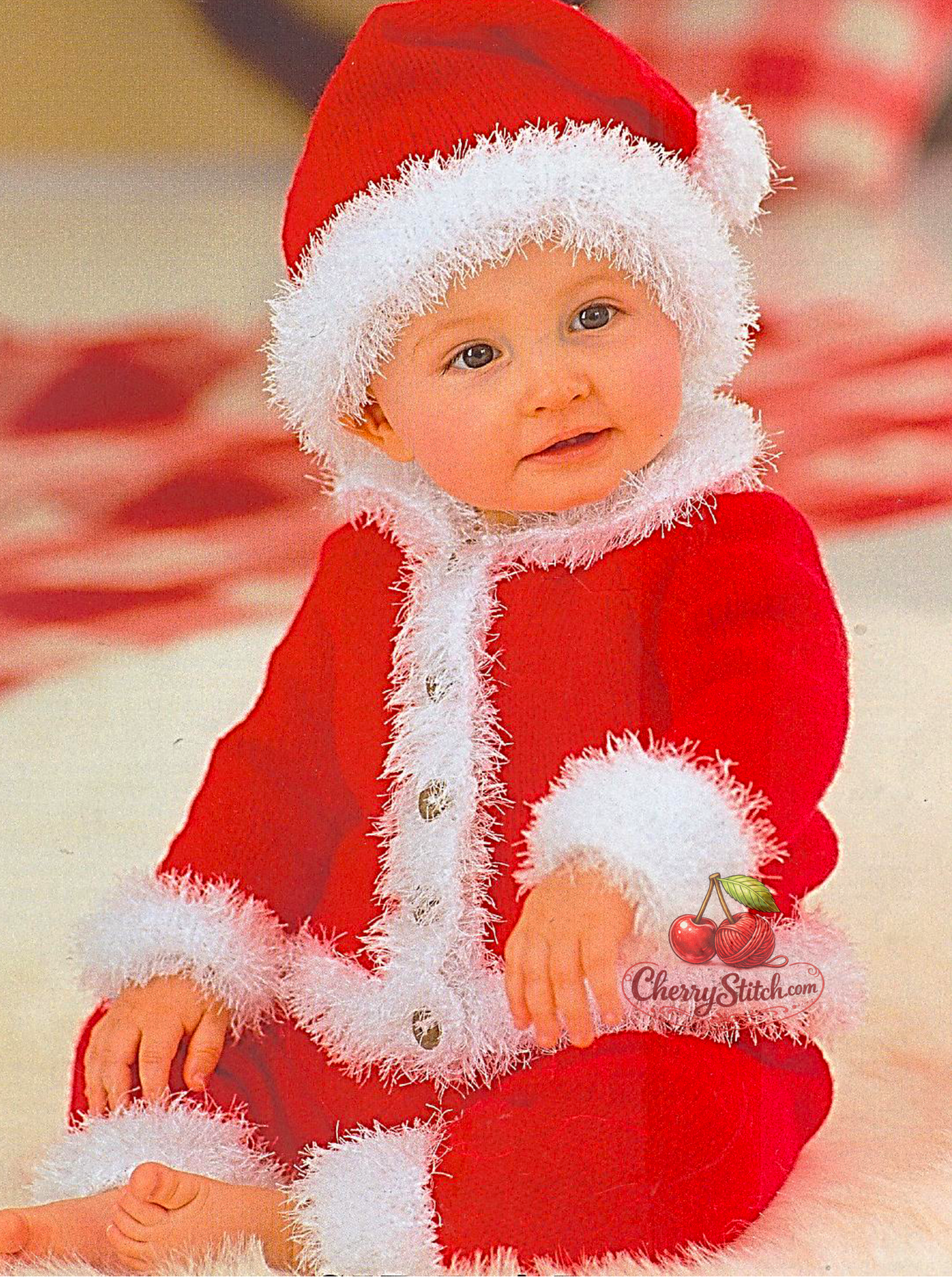 Vintage baby Santa suit knitting pattern — 3-piece Christmas outfit including button-up jacket, elastic-waist trousers and pom pom stocking hat, worked in red and white stocking stitch with Funky Fur trim. DK 8ply yarn, 16''–22'' (41–56 cm) chest, approx. 0–24 months. Intermediate knitting.

