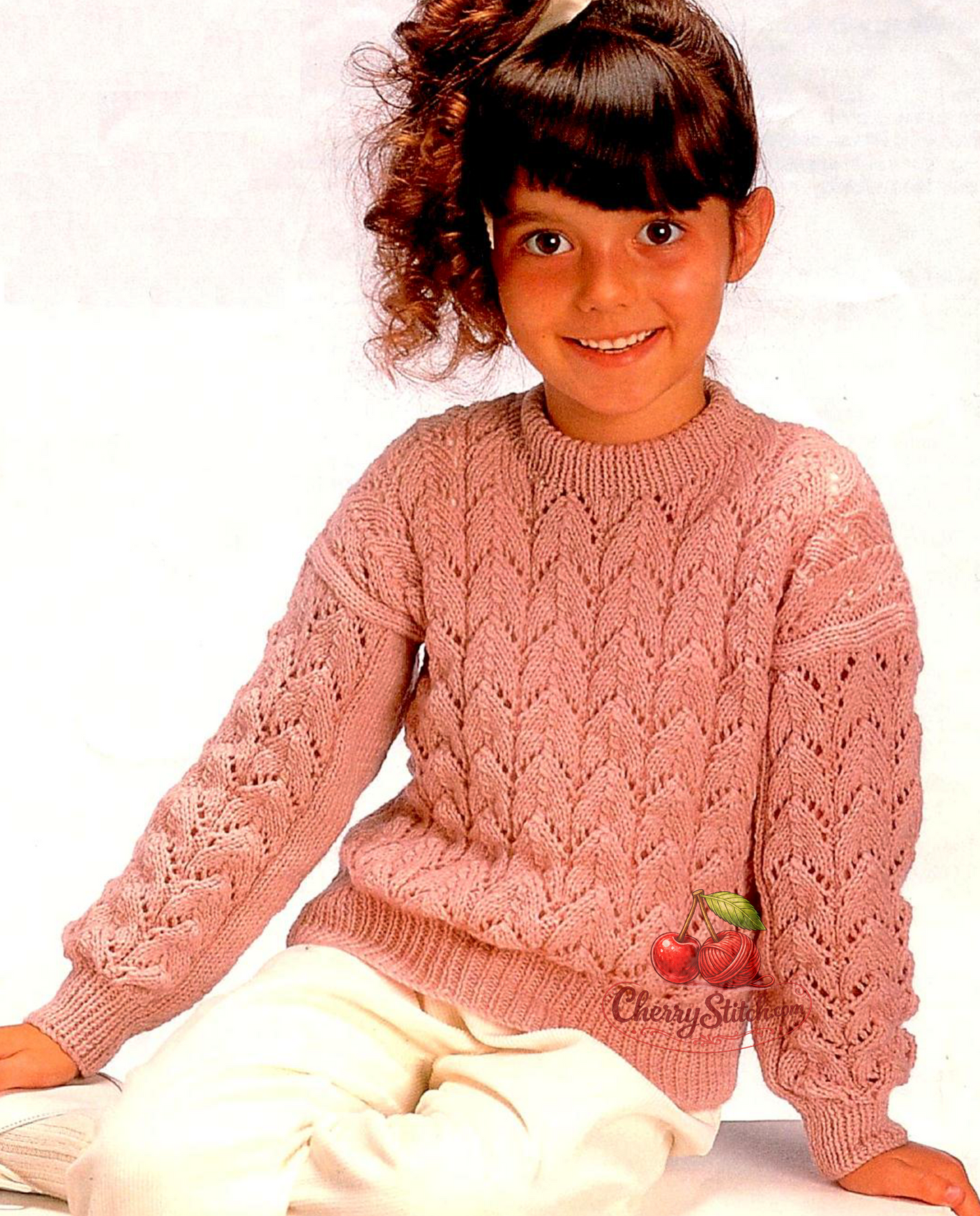 Vintage girl's lacy sweater knitting pattern — classic horseshoe lace pattern, worked bottom up. DK 8ply yarn, 22''–32'' (56–81 cm) chest, approx. 2–12 years, 6 sizes. Intermediate knitting. 1970s.
