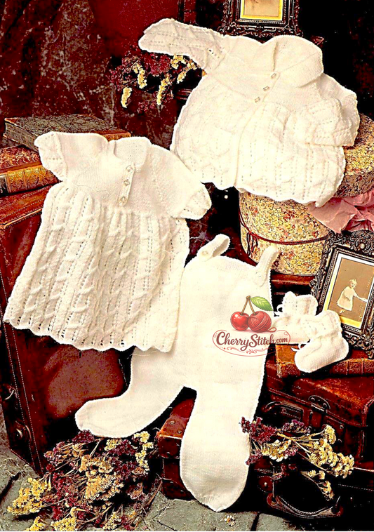 Vintage baby boy and girl outfits knitting pattern — 4-piece set including dress, jacket, dungarees and bootees with lace panels. Large print. DK 8ply yarn, 16''–22'' (41–56 cm) chest, approx. birth to 15 months. Intermediate knitting.

