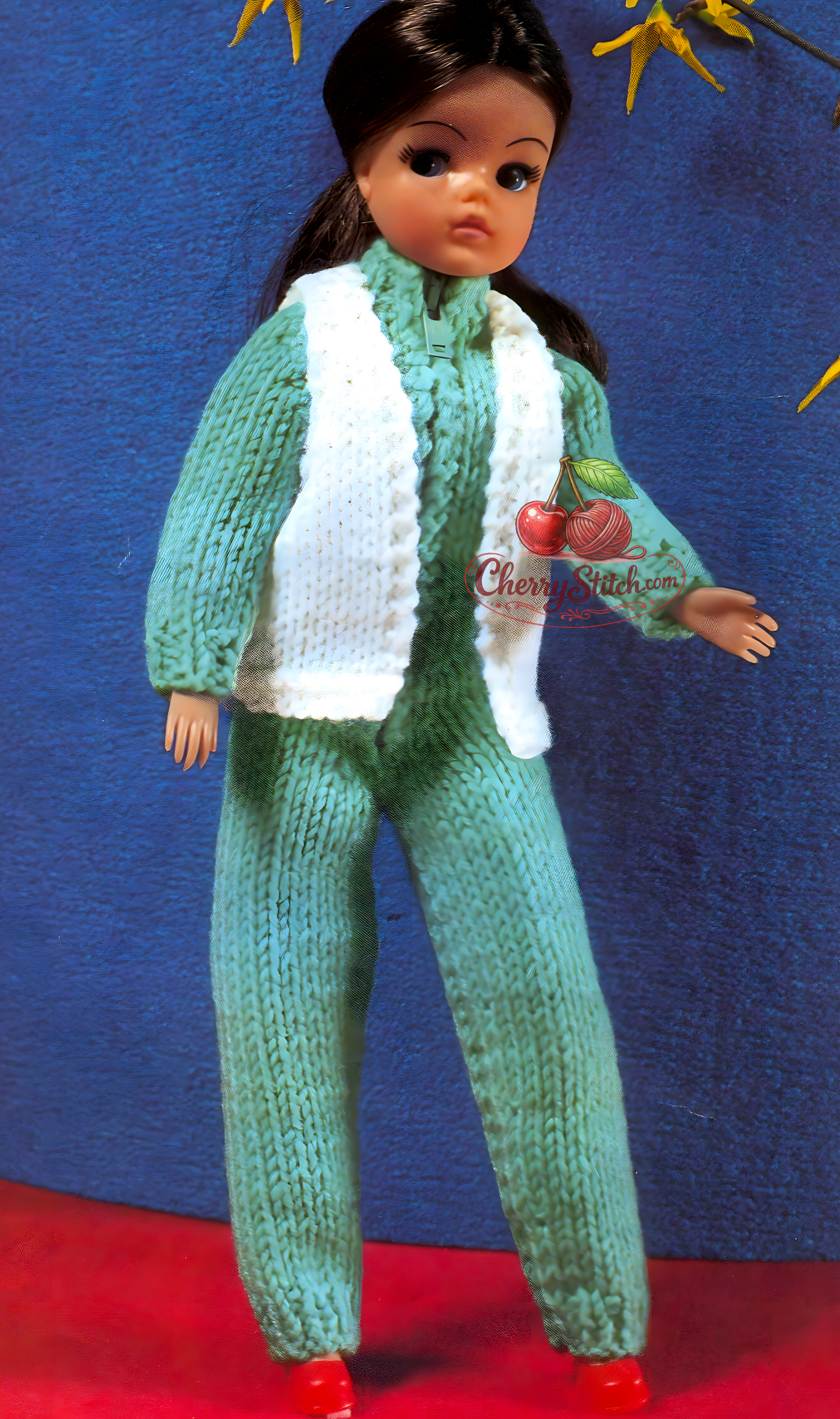 Female Fashion Doll in knitted jumpsuit/flying suit and gilet – restored vintage 1980s pattern
