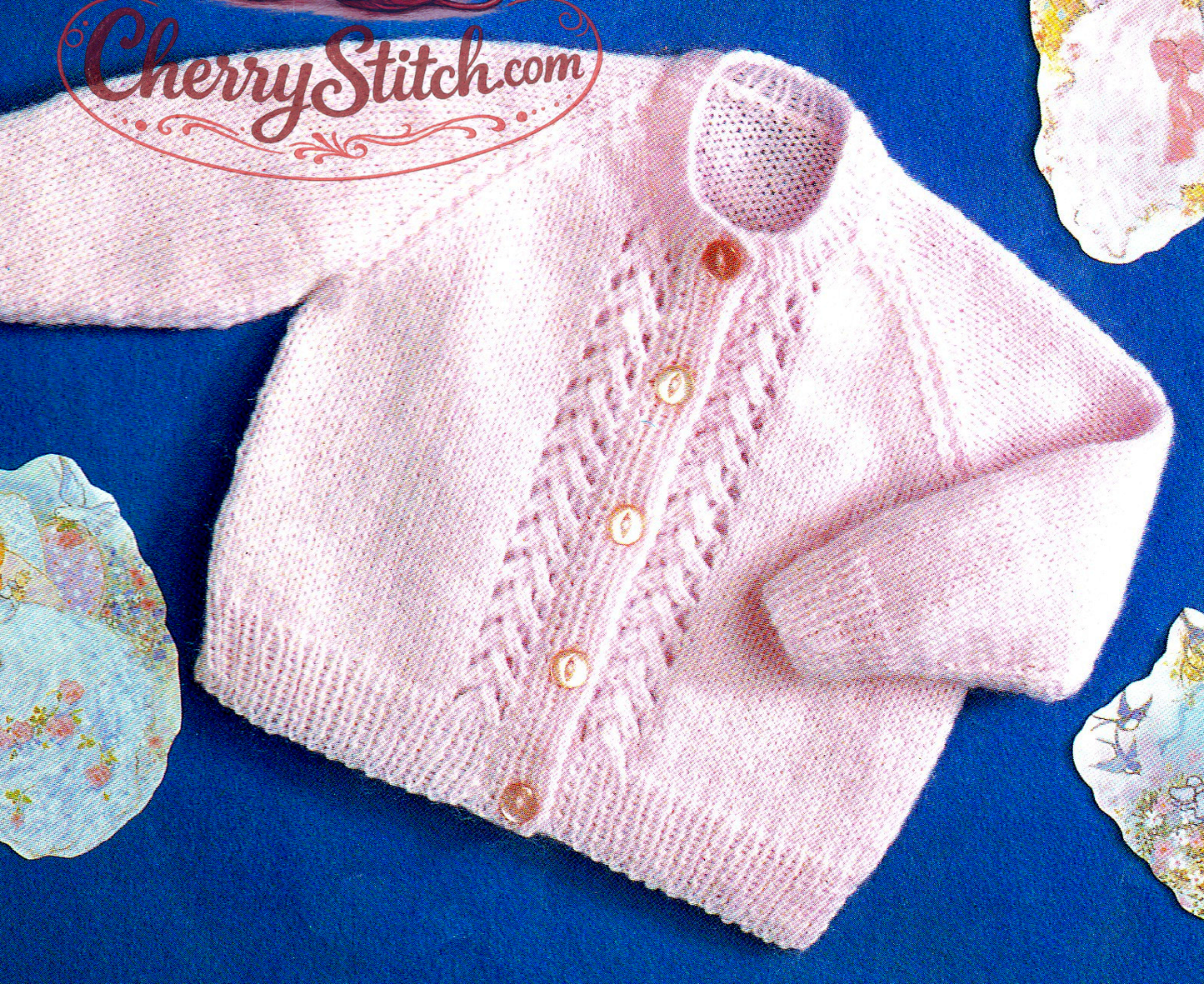 Close-up of vertical lace panel columns on baby raglan cardigan – restored vintage 1980s knitting pattern in DK