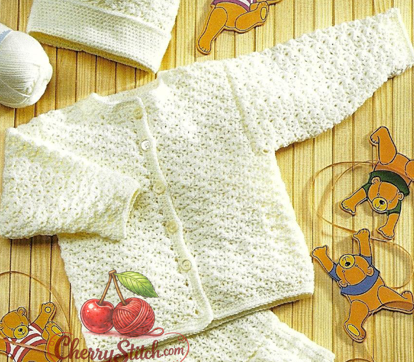 Close-up of lacy round neck baby cardigan – restored vintage 1990s crochet pattern in UK terms