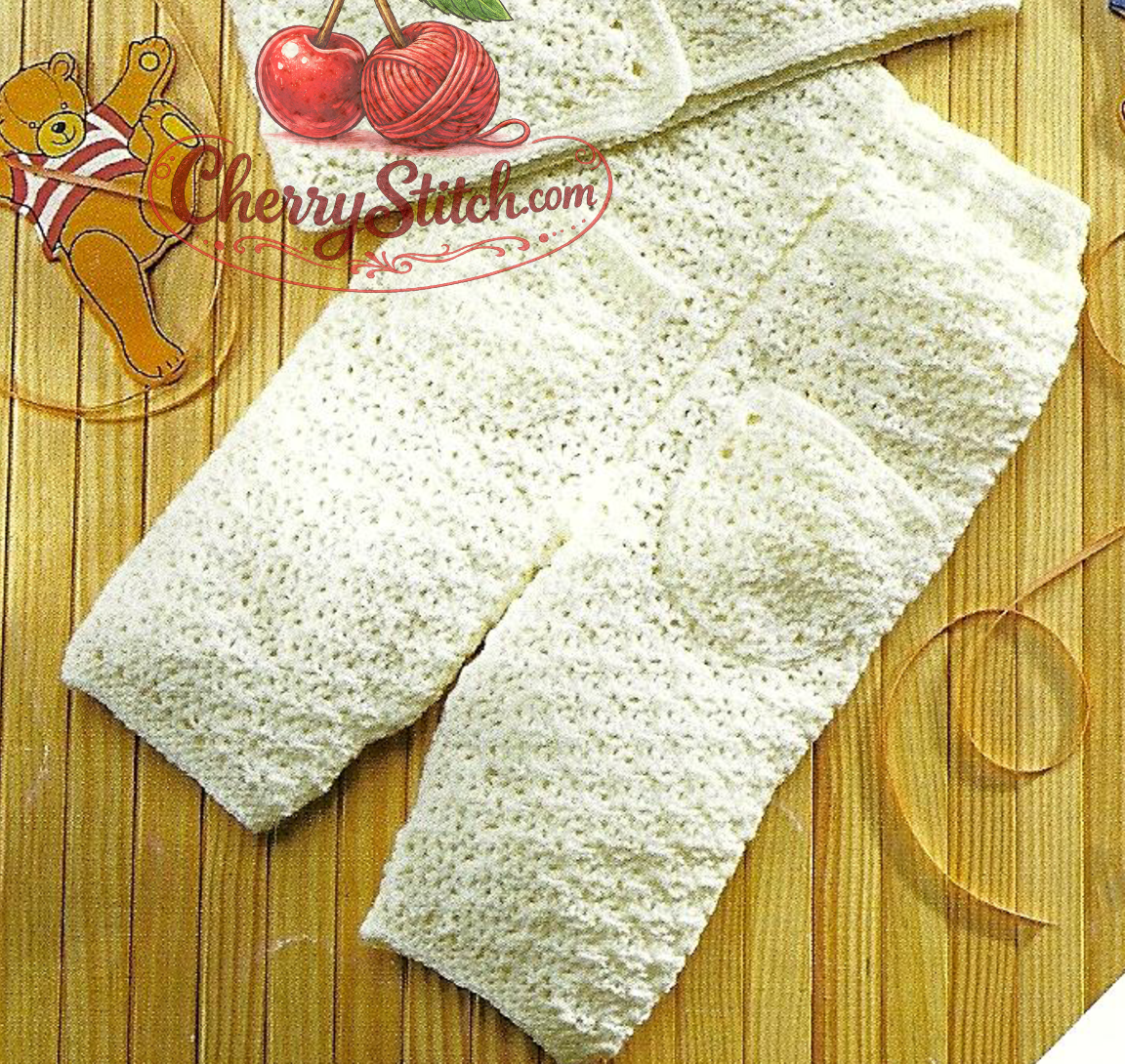 Close-up of crocheted baby trousers – restored vintage 1990s baby set crochet pattern