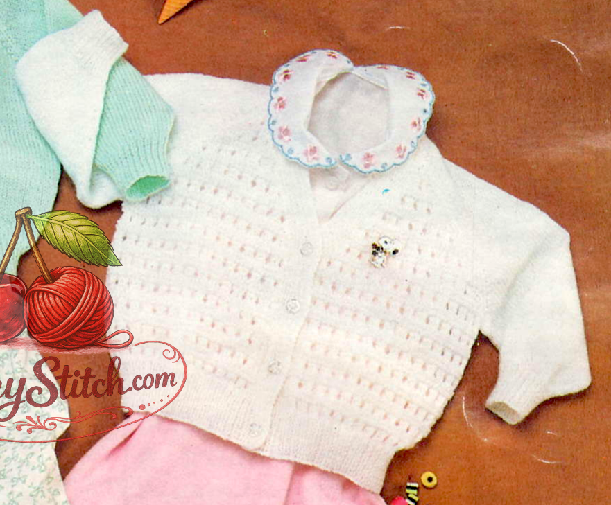 Close-up of lace front panel on V-neck raglan baby cardigan – restored vintage 1970s knitting pattern in 3-ply