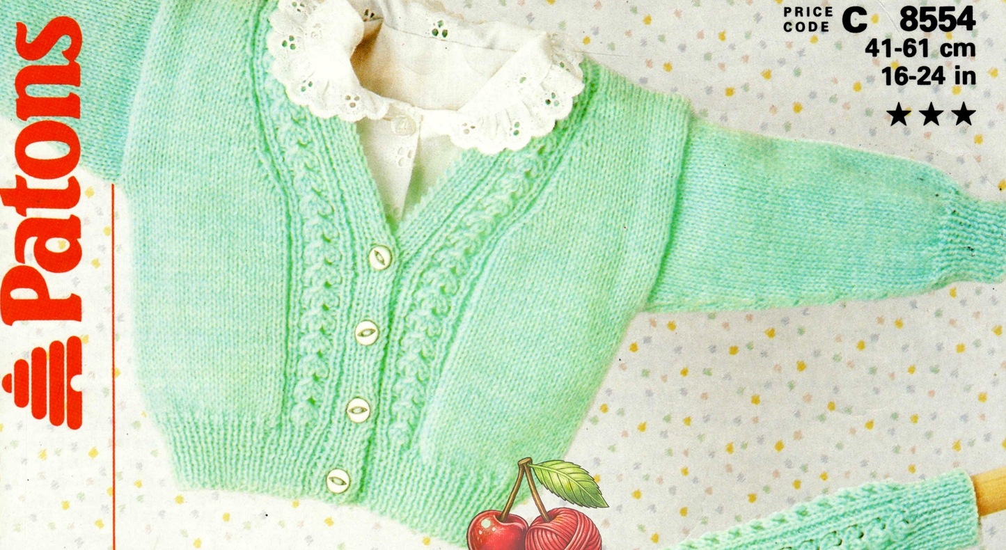 Close-up of V-neck cardigan with textured rib front panels – restored vintage 1980s baby child knitting pattern in 4-ply