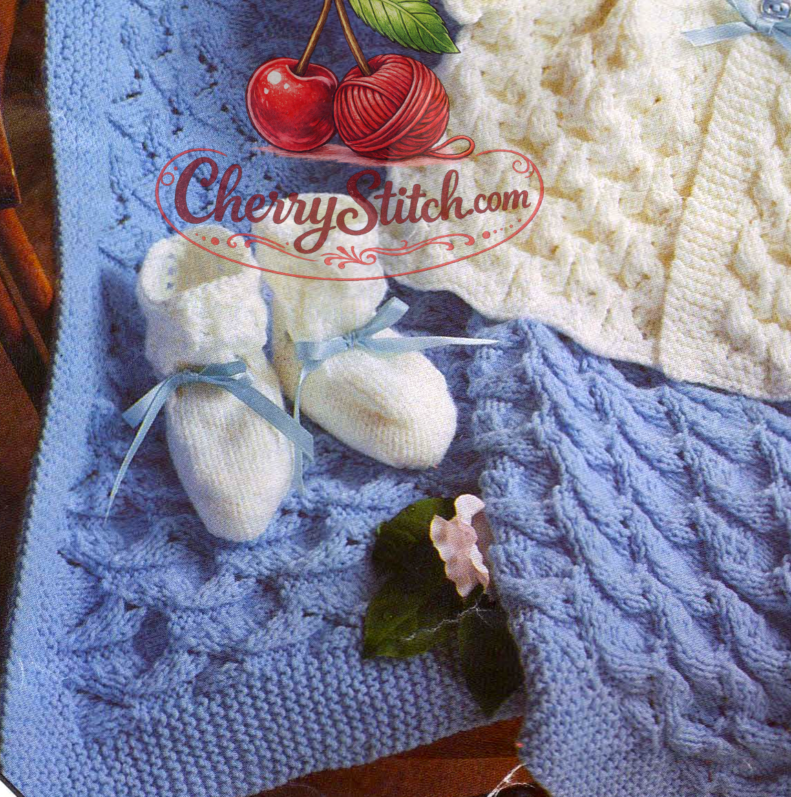 Close-up of knitted baby shawl in textured stitch – restored vintage 1970s pattern in DK