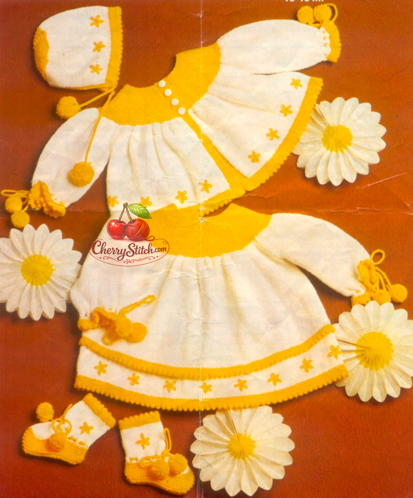 Baby Daisy Princess layette – restored vintage 1970s knitting pattern with matinee coat, cardigan, dress, bonnet and bootees in white and golden yellow with lazy daisy embroidery, 4-ply