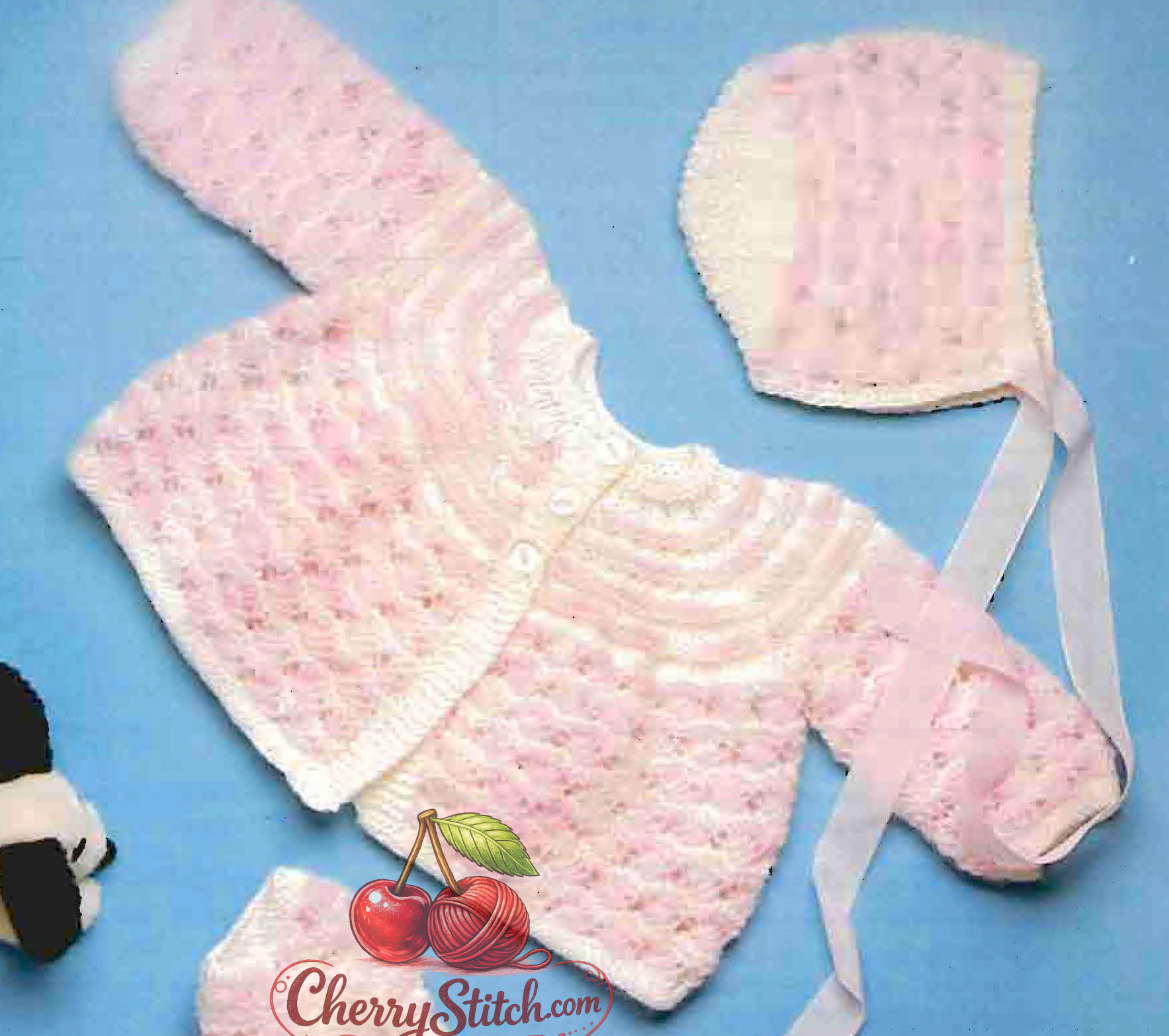 Close-up of baby girl's matinee coat and bonnet – vintage 1980s layette knitting pattern DK