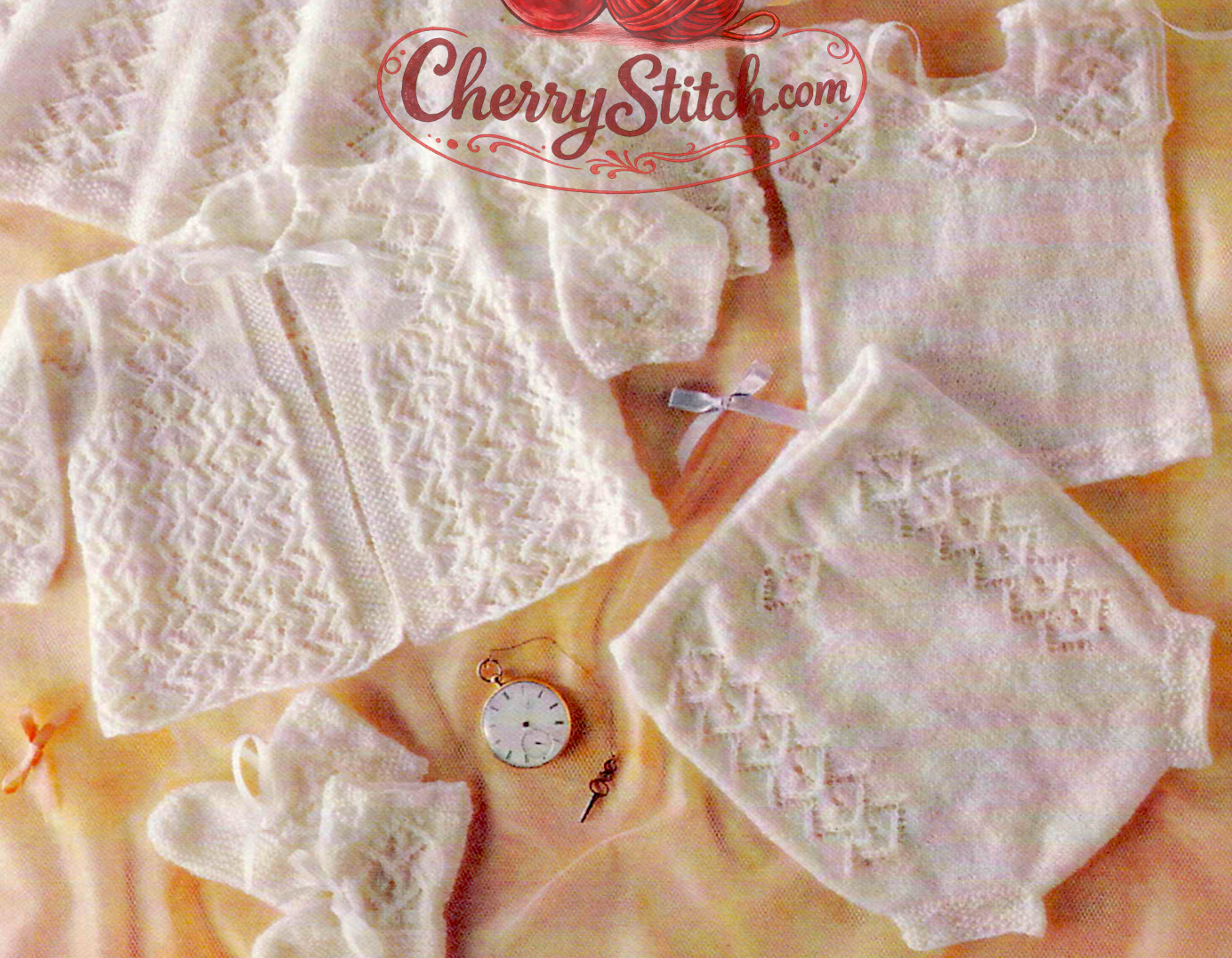 Close-up of matinee jacket, vest, pilchers, bonnet and booties – restored vintage 1980s baby heirloom christening layette in Victorian lace, 2-ply