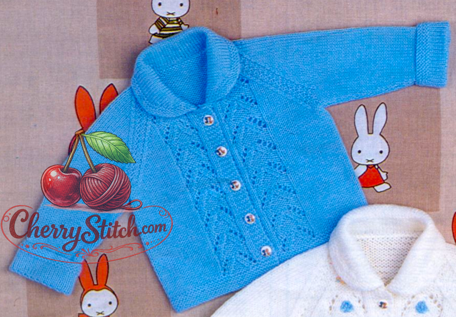 Close-up of blue knitted baby raglan jacket with lacy panels and rounded collar – restored vintage 1980s pattern