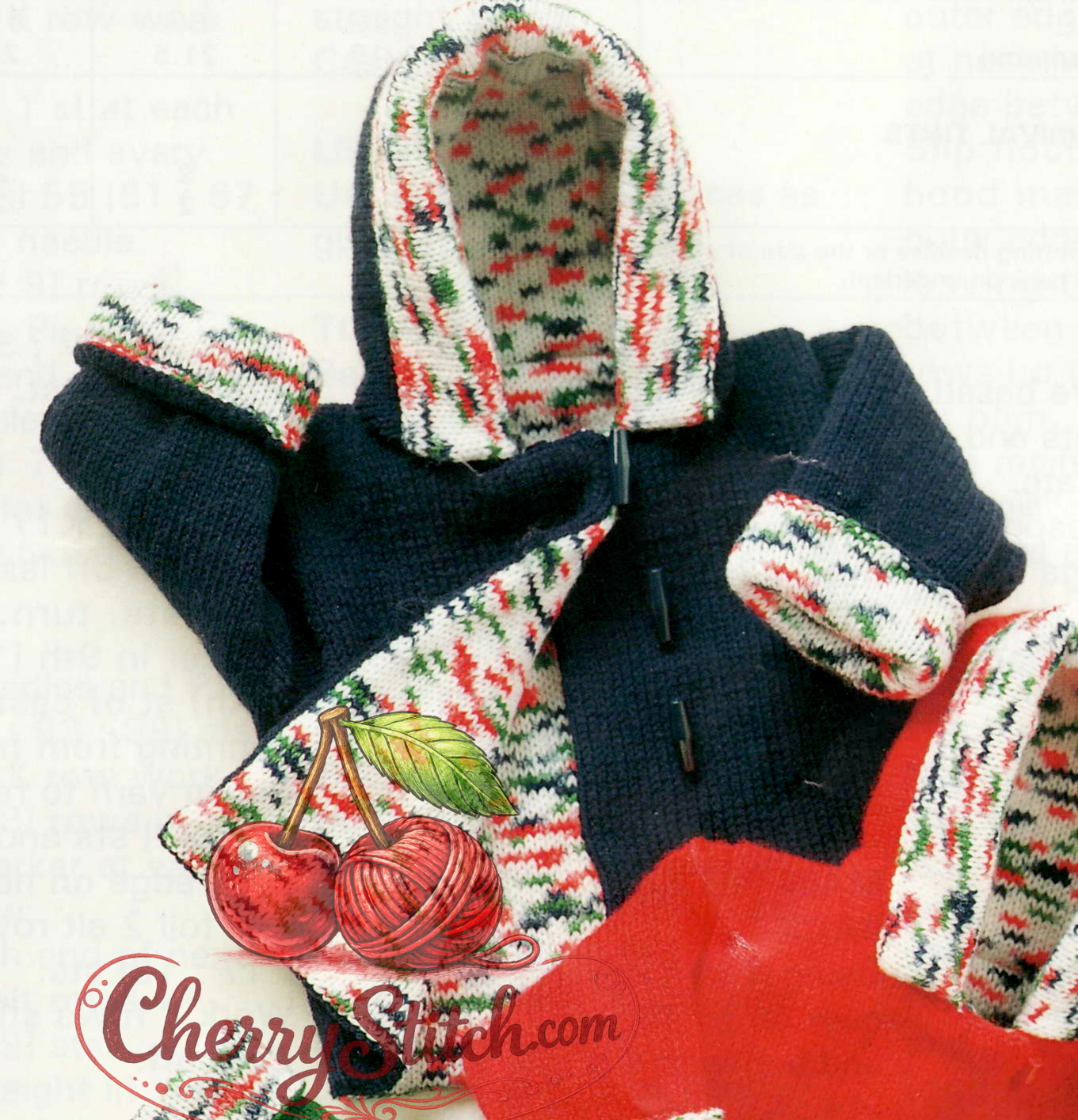 Close-up of blue knitted baby lined hooded jacket – restored vintage 1990s pattern
