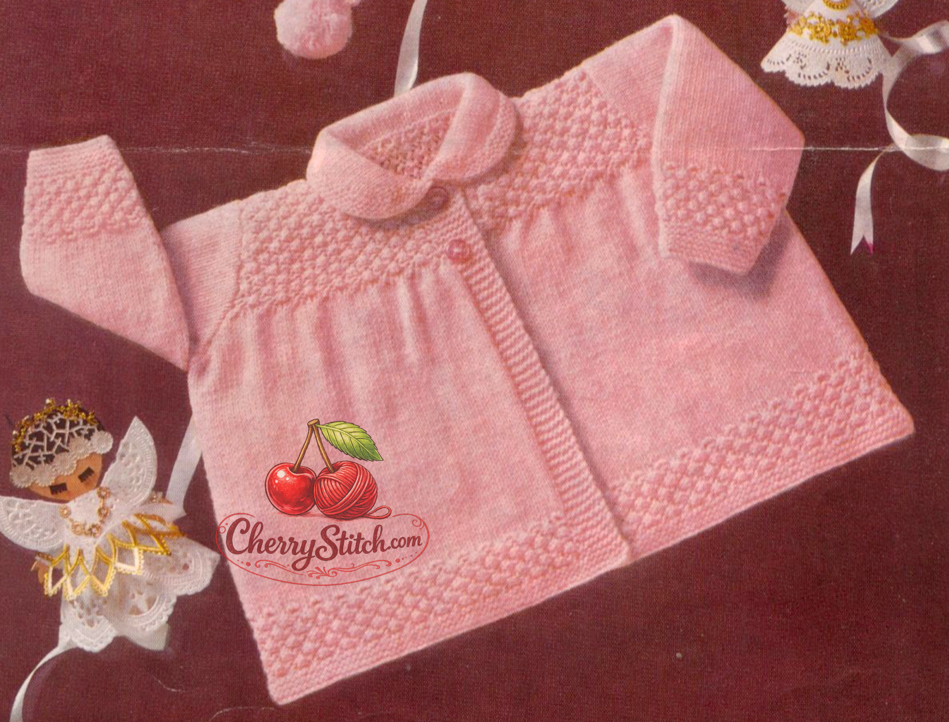 Close-up of round collar, deep garter stitch yoke and sleeve cuffs on baby matinee coat – restored vintage 1960s knitting pattern in 4-ply

