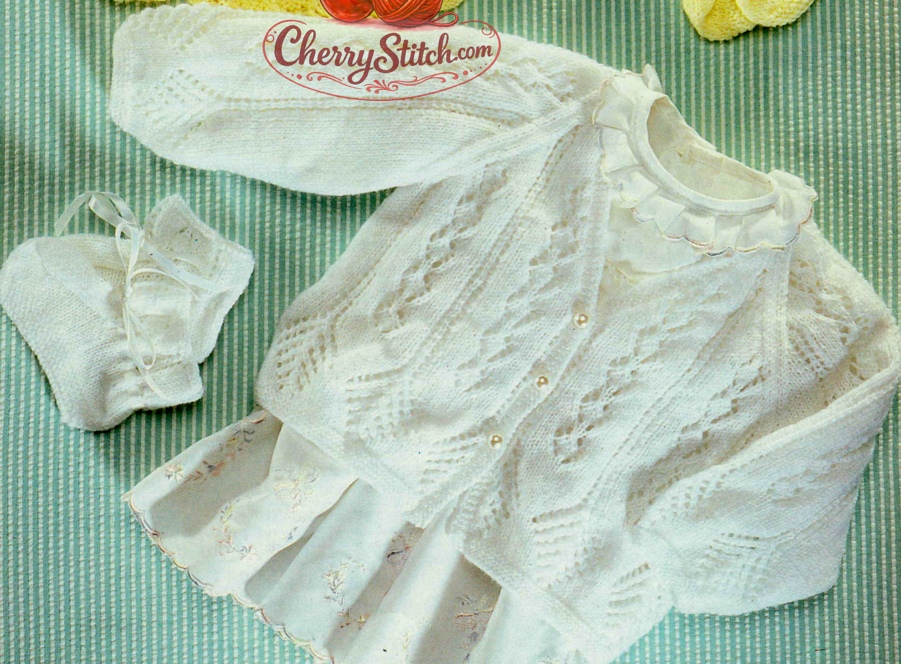 Close-up of baby V-neck raglan cardigan and bootees arrowhead lace – vintage 1990s knitting pattern 3-ply