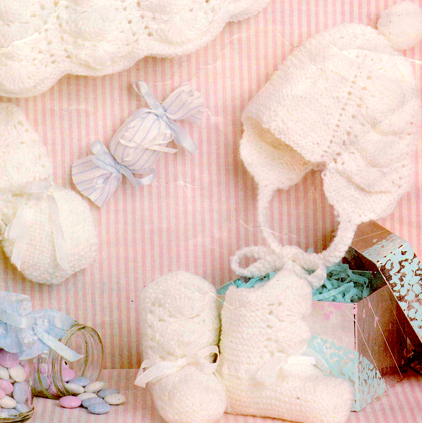 Close-up of baby hat and mitts – vintage 1980s knitting pattern 4ply