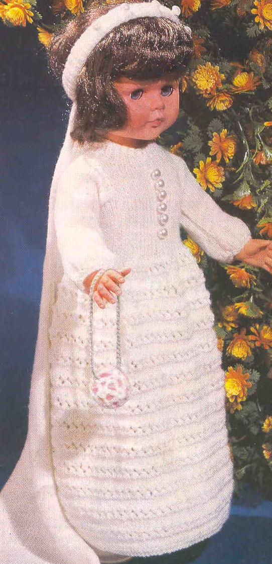 Close-up of miniature bride's wedding dress and veil detail – restored vintage 1960s doll knitting pattern in DK