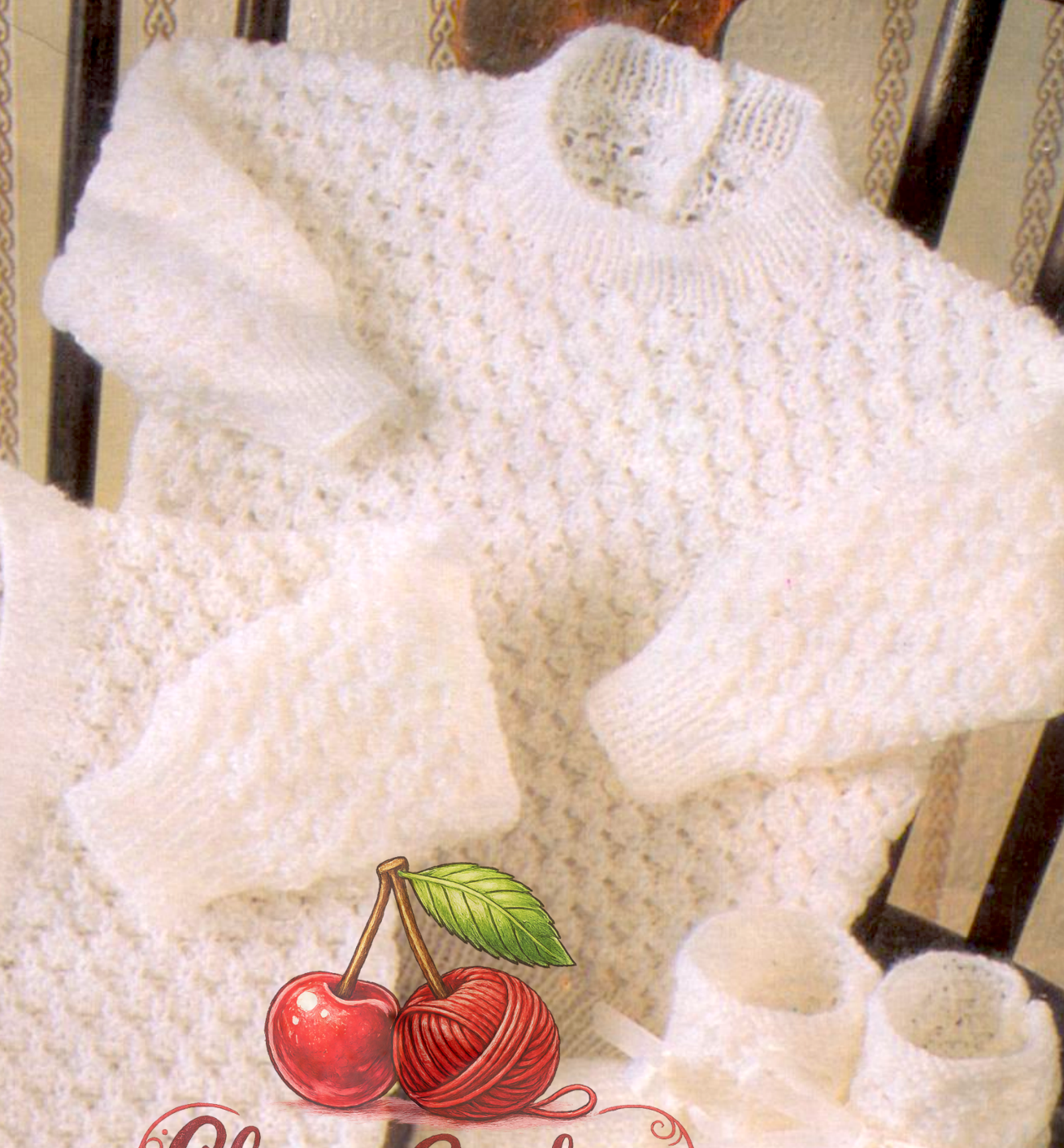 Close-up of white knitted baby sweater – restored vintage 1980s baby set knitting pattern
