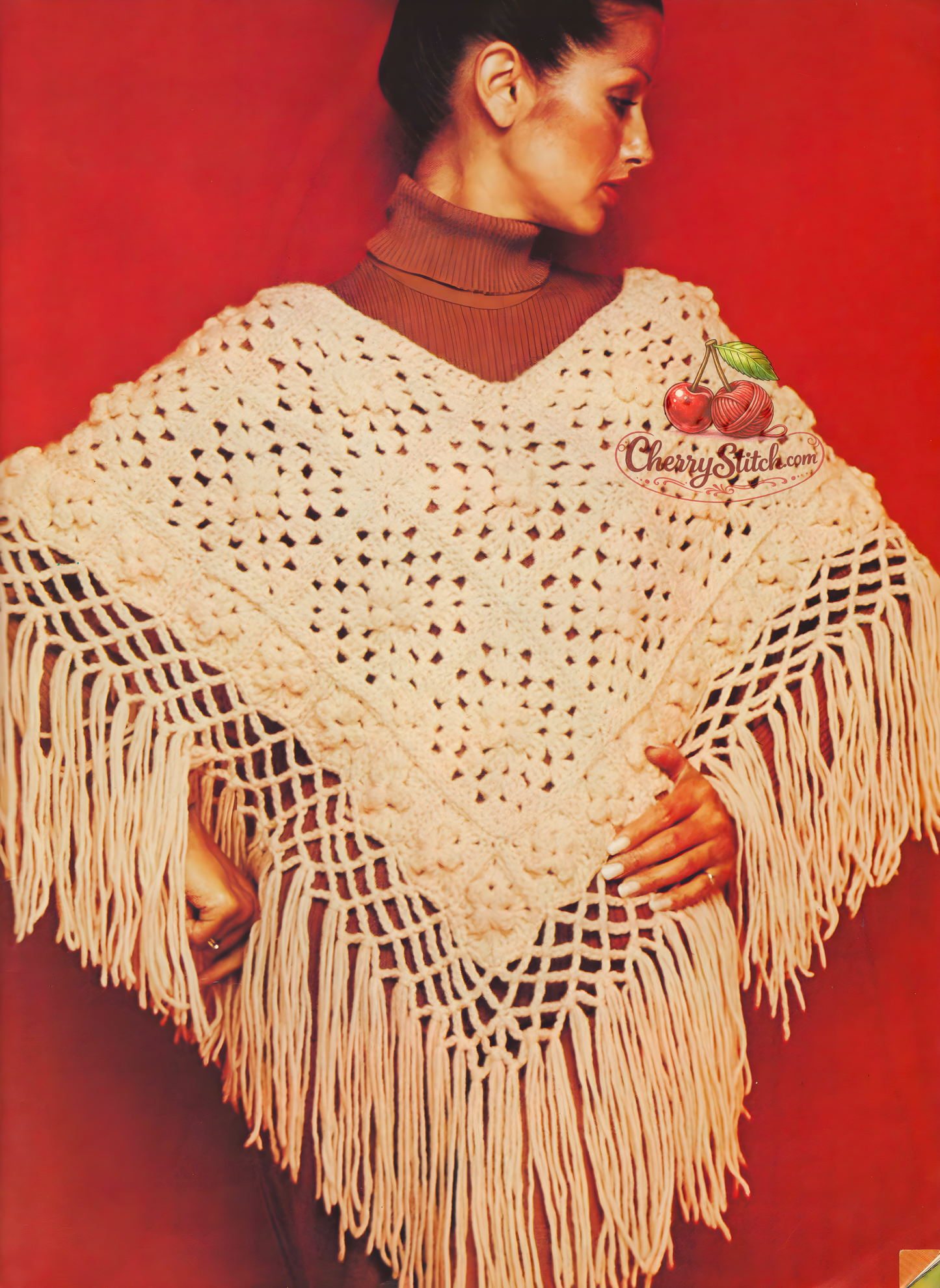 Women's fringed crochet poncho made from small and large granny squares – restored vintage 1980s pattern